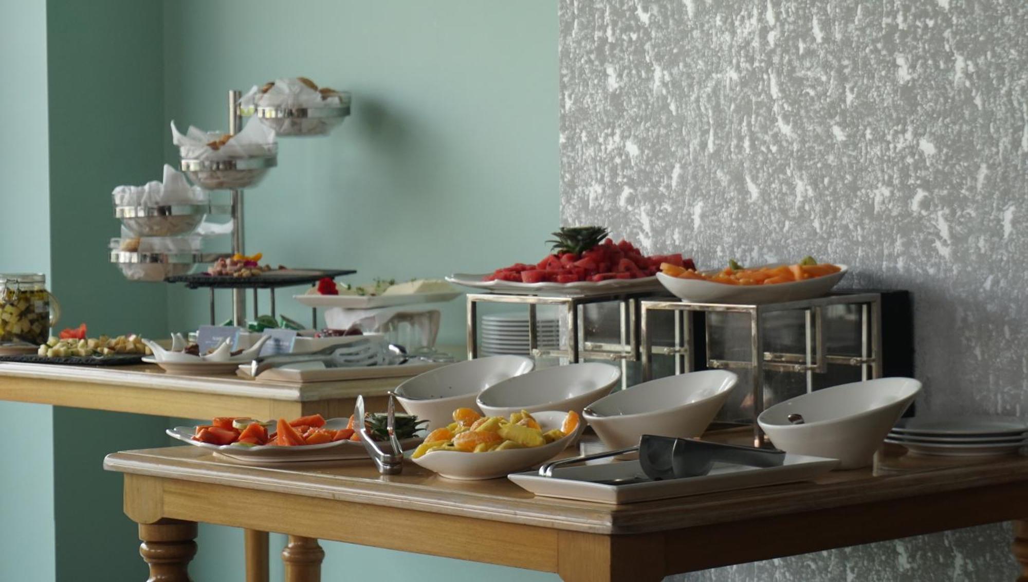 Quo Quality Hotel Манисалес Экстерьер фото A buffet