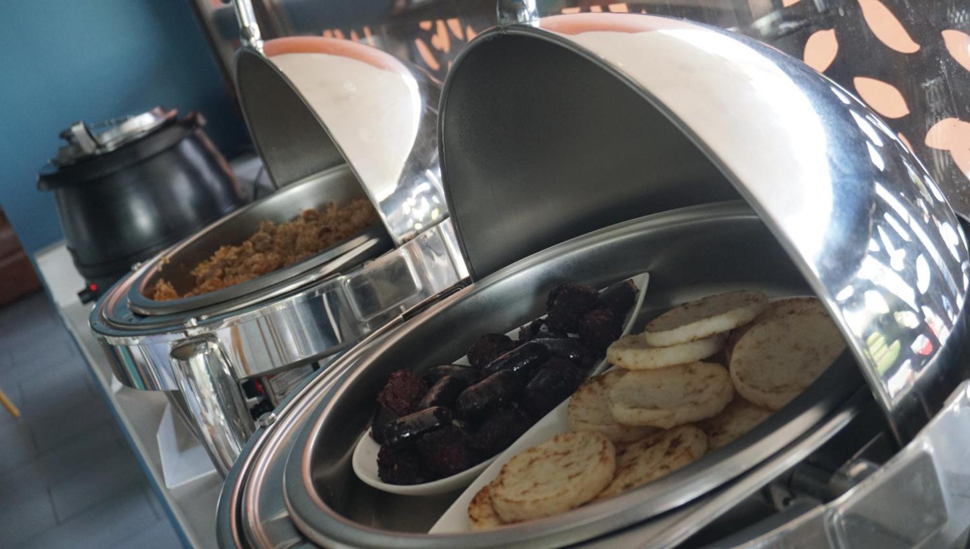 Quo Quality Hotel Манисалес Экстерьер фото A chafing dish