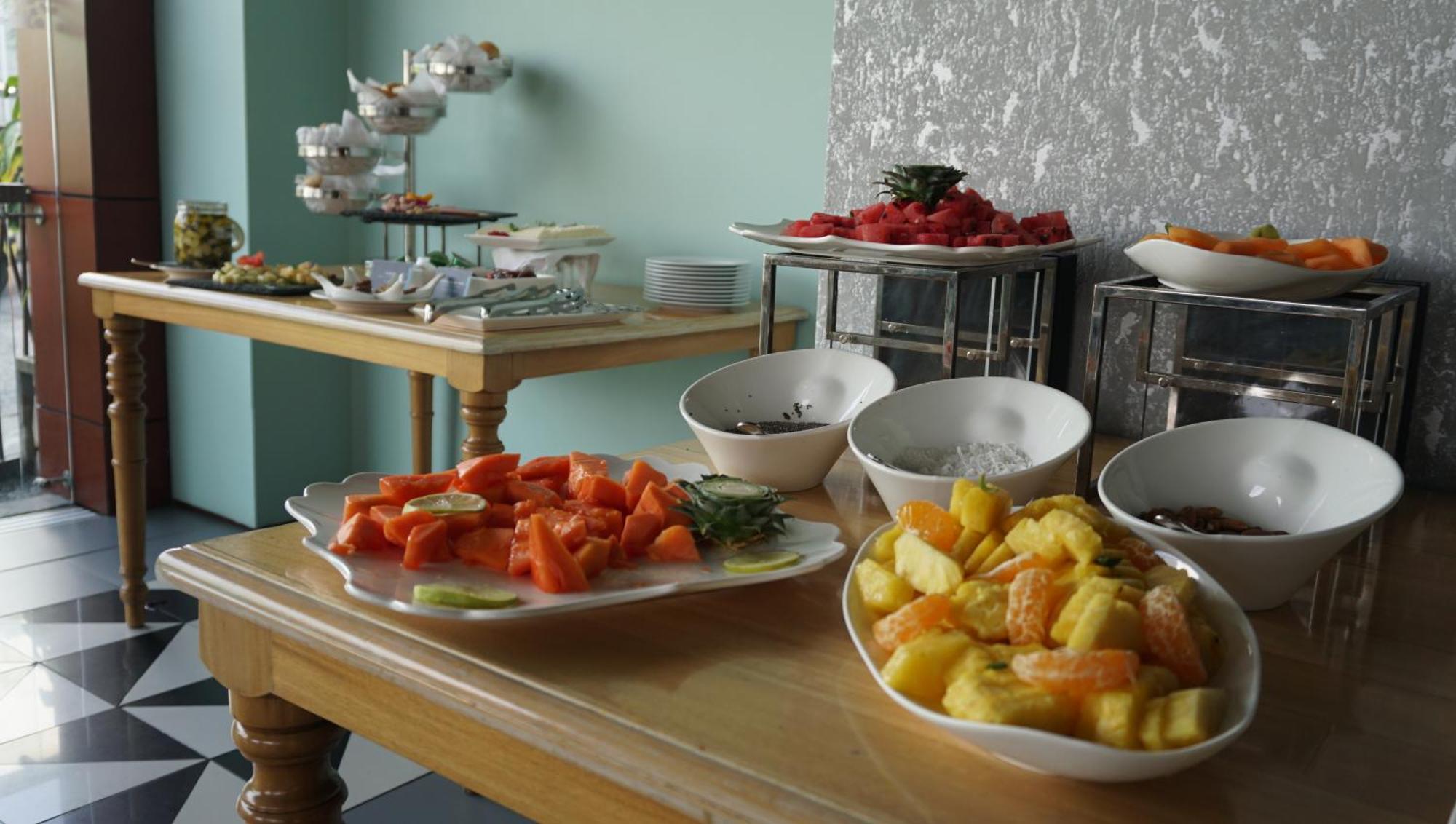 Quo Quality Hotel Манисалес Экстерьер фото Fruit salad